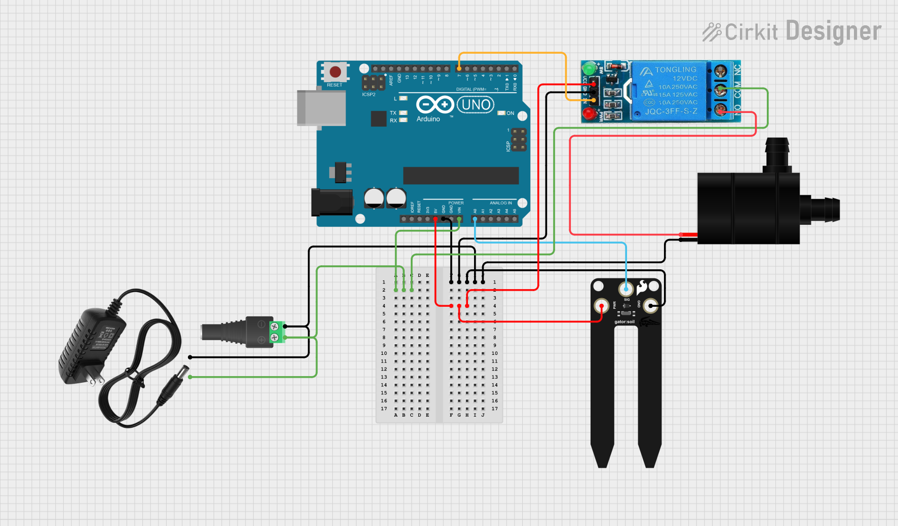 Image of Watering Plant: A project utilizing SparkFun gator:environment in a practical application